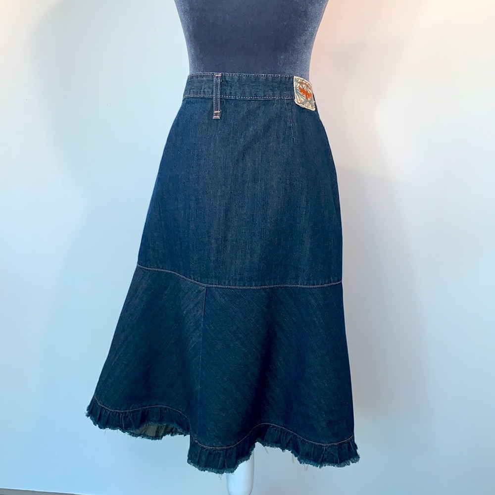 Levi Jean Skirt size 12, 100% cotton with a fringe trim.
